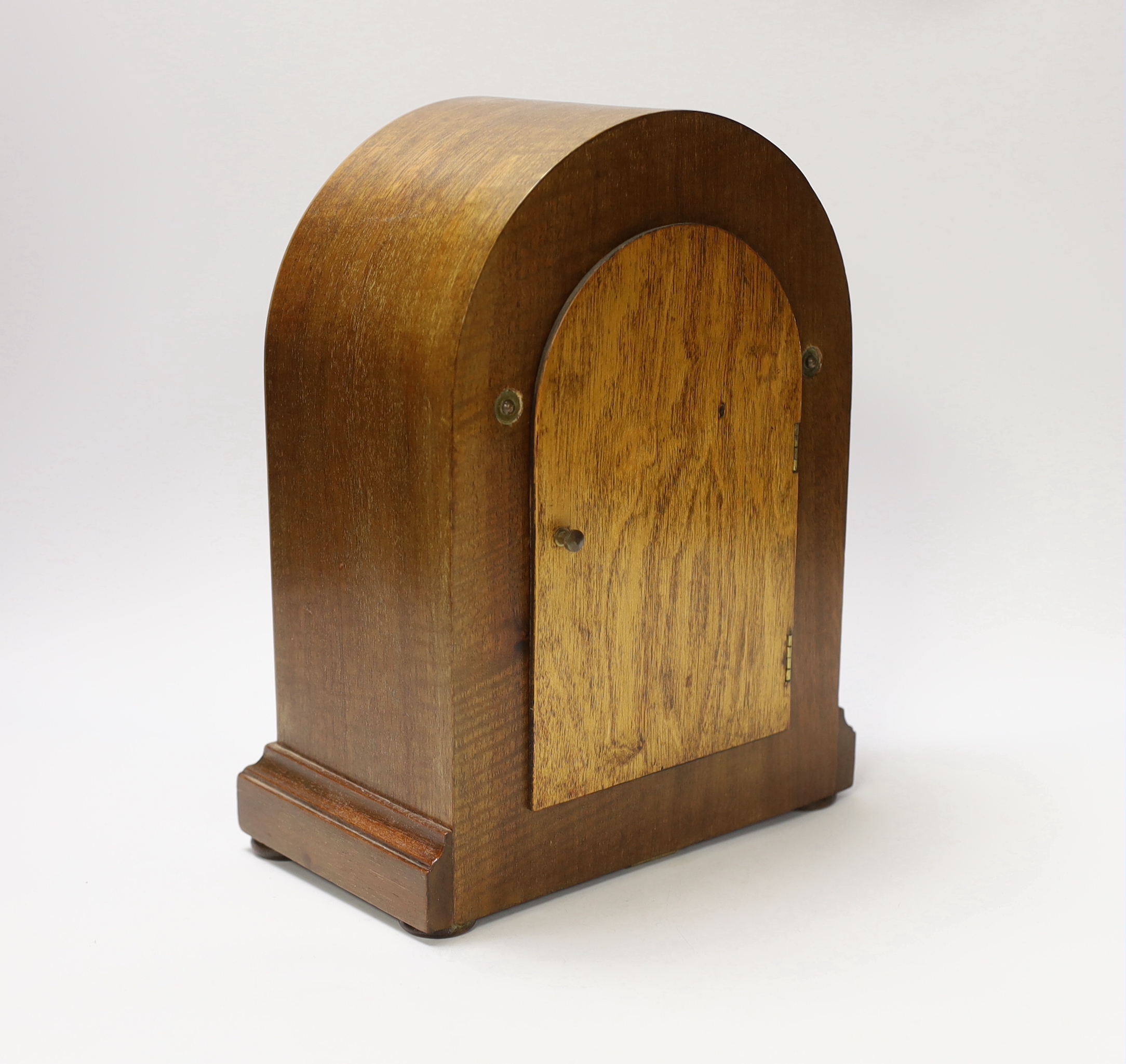 A mahogany Bulle-clock electric mantel timepiece, 30cm